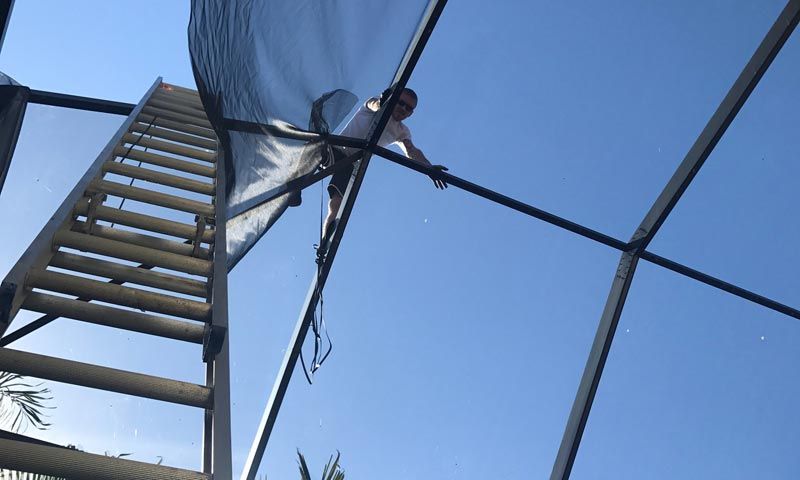 Man Installing Screen Enclosure - Bradenton, FL - Screens Now
