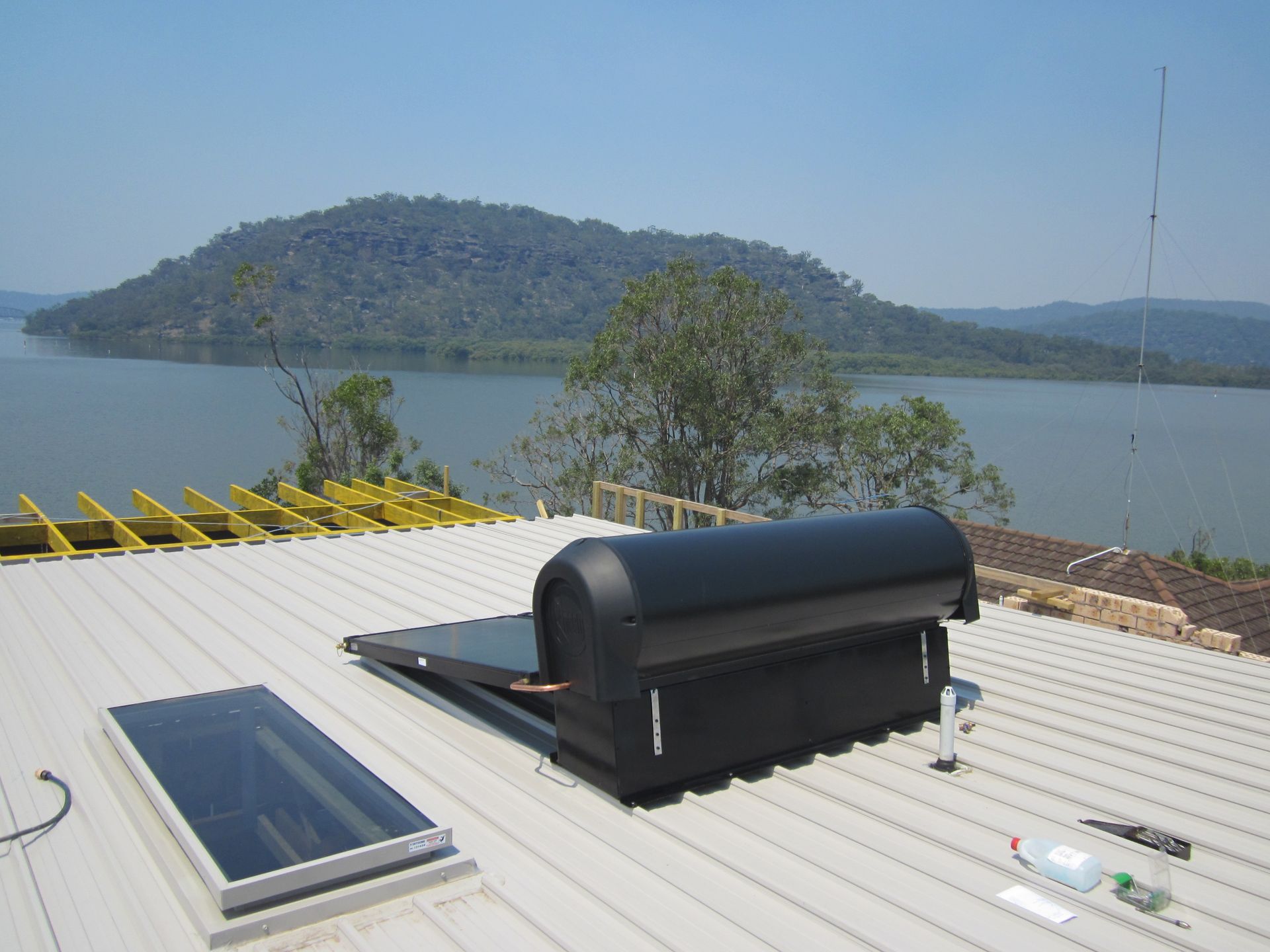 Solar Water Heater on a Rooftop — Solar Services in Erina, NSW
