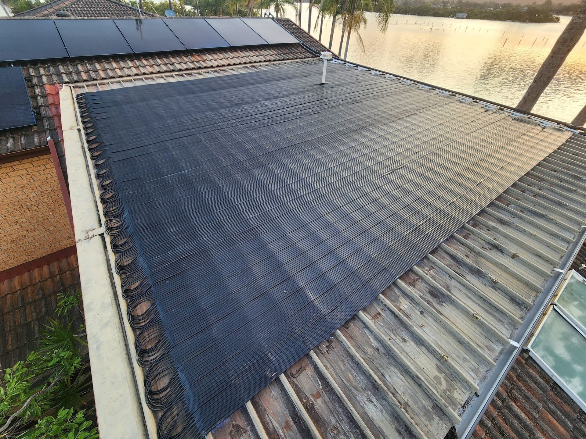 An Aerial View of Solar Panels — Solar Services in Kincumber, NSW