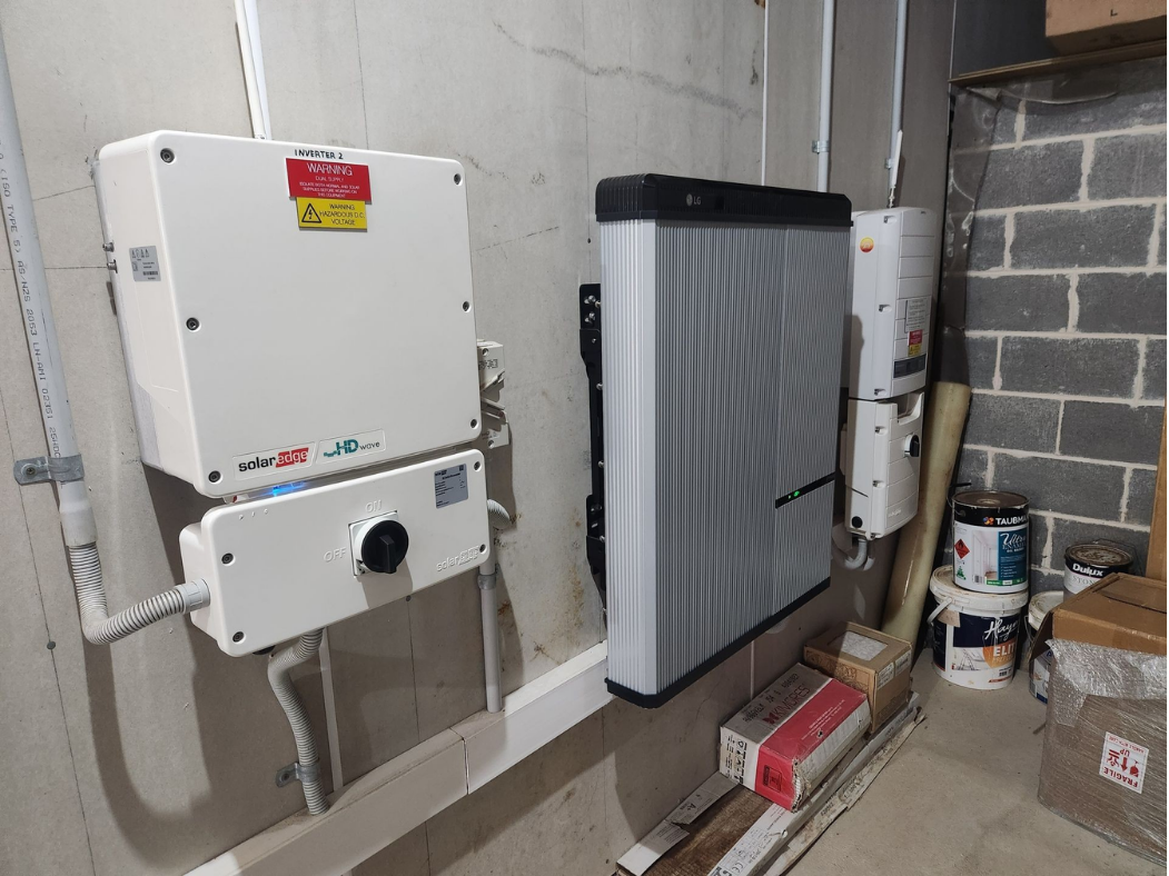 A Room With a Lot of Electrical Equipment on the Wall — Solar Services in Erina, NSW