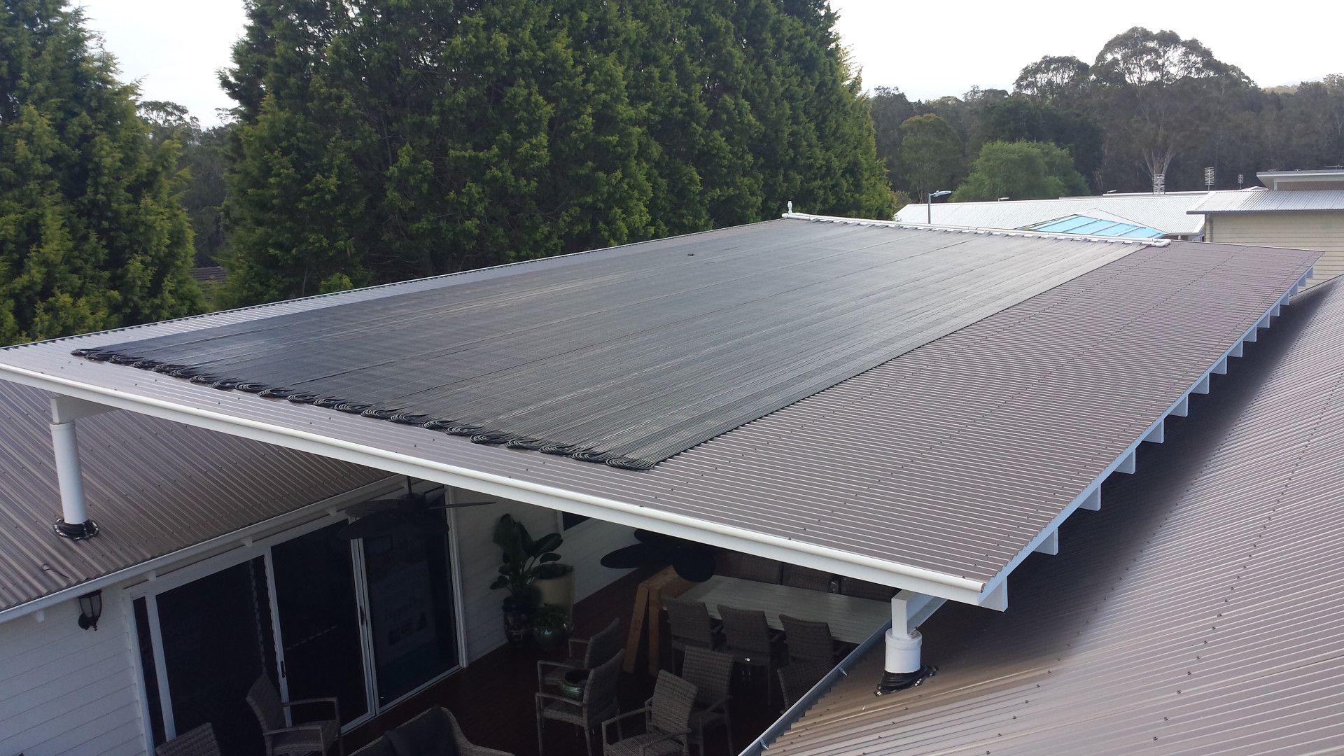 Solar Panels on a Covered Patio Roof — Solar Services in Erina, NSW