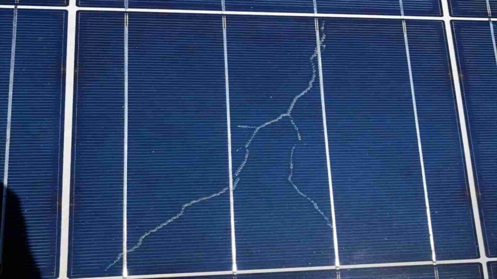 Solar Panels on a Roof Overlooking Ocean, Blue Sky — Solar Services in Erina, NSW