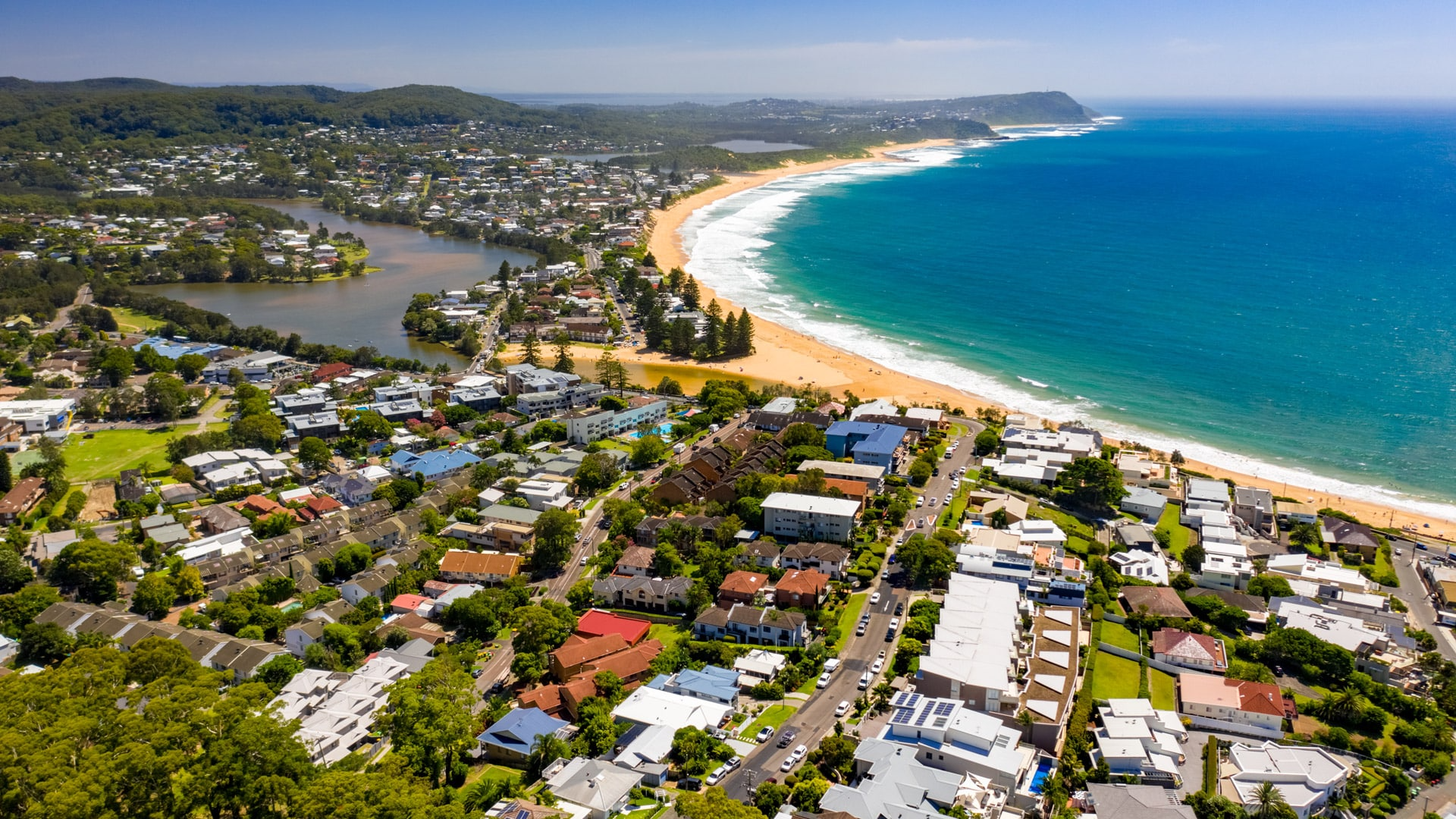 An Aerial View of a Small Island in the Middle of the Ocean — Solar Services in Terrigal, NSW