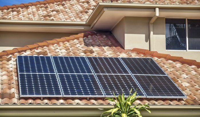 A House With a Lot of Solar Panels on the Roof — Solar Services in Terrigal, NSW