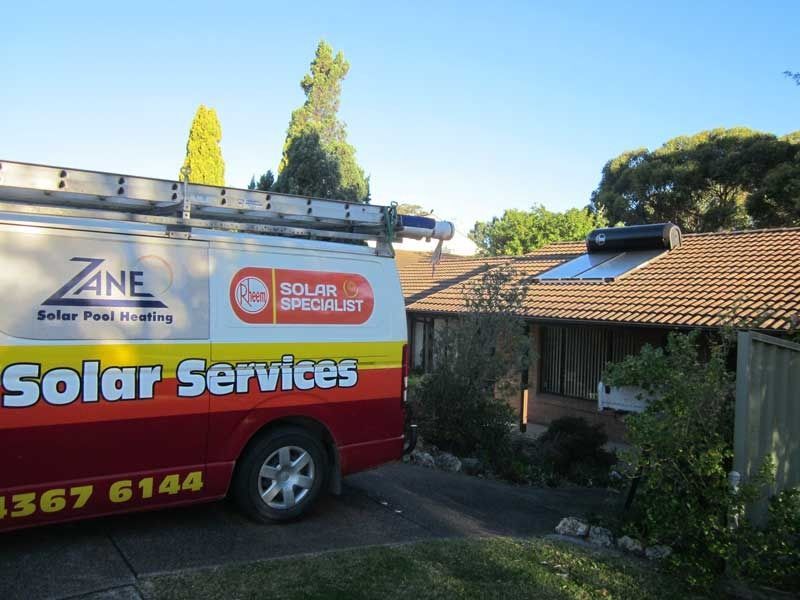 A Solar Services Van is Parked in Front of a House — Solar Services in Erina, NSW