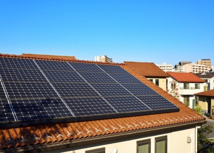 There Are Many Solar Panels on the Roof of a House — Solar Services in Erina, NSW
