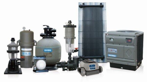 A Group of Swimming Pool Equipment is Lined Up on a White Background — Solar Services in Erina, NSW