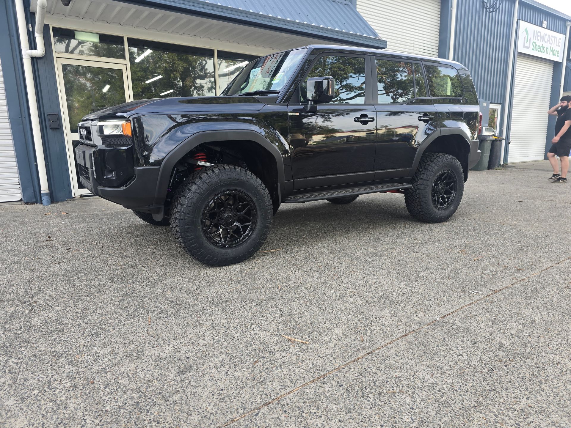 4x4 truck on the road showcasing performance after suspension upgrades. 4x4 truck on the road showcasing performance after suspension upgrades.