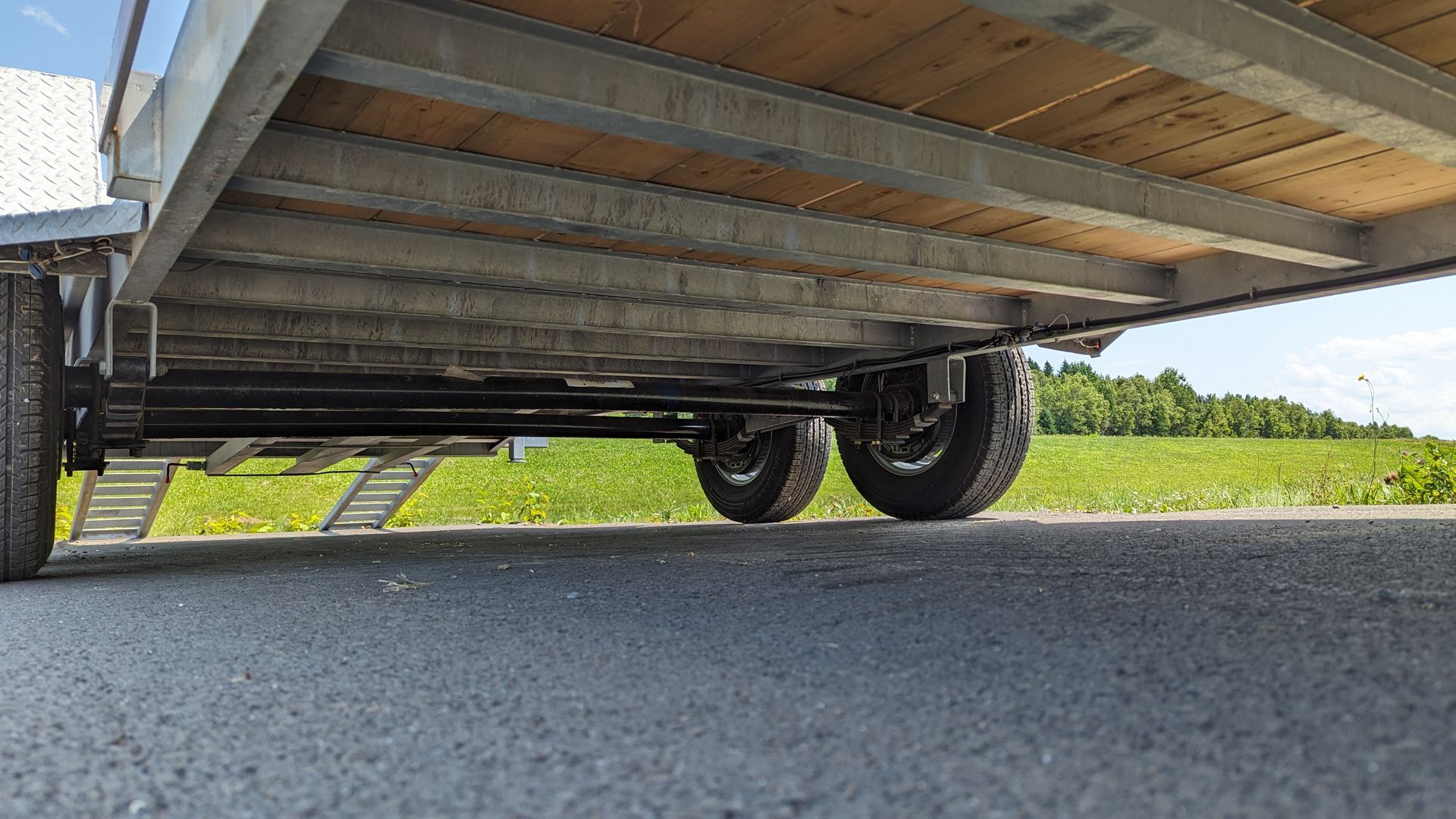 A trailer is parked on the side of the road.