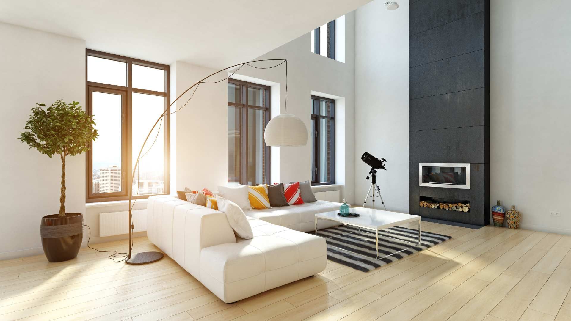 Bright modern living room with white sectional sofa, tall windows, fireplace, and striped rug.