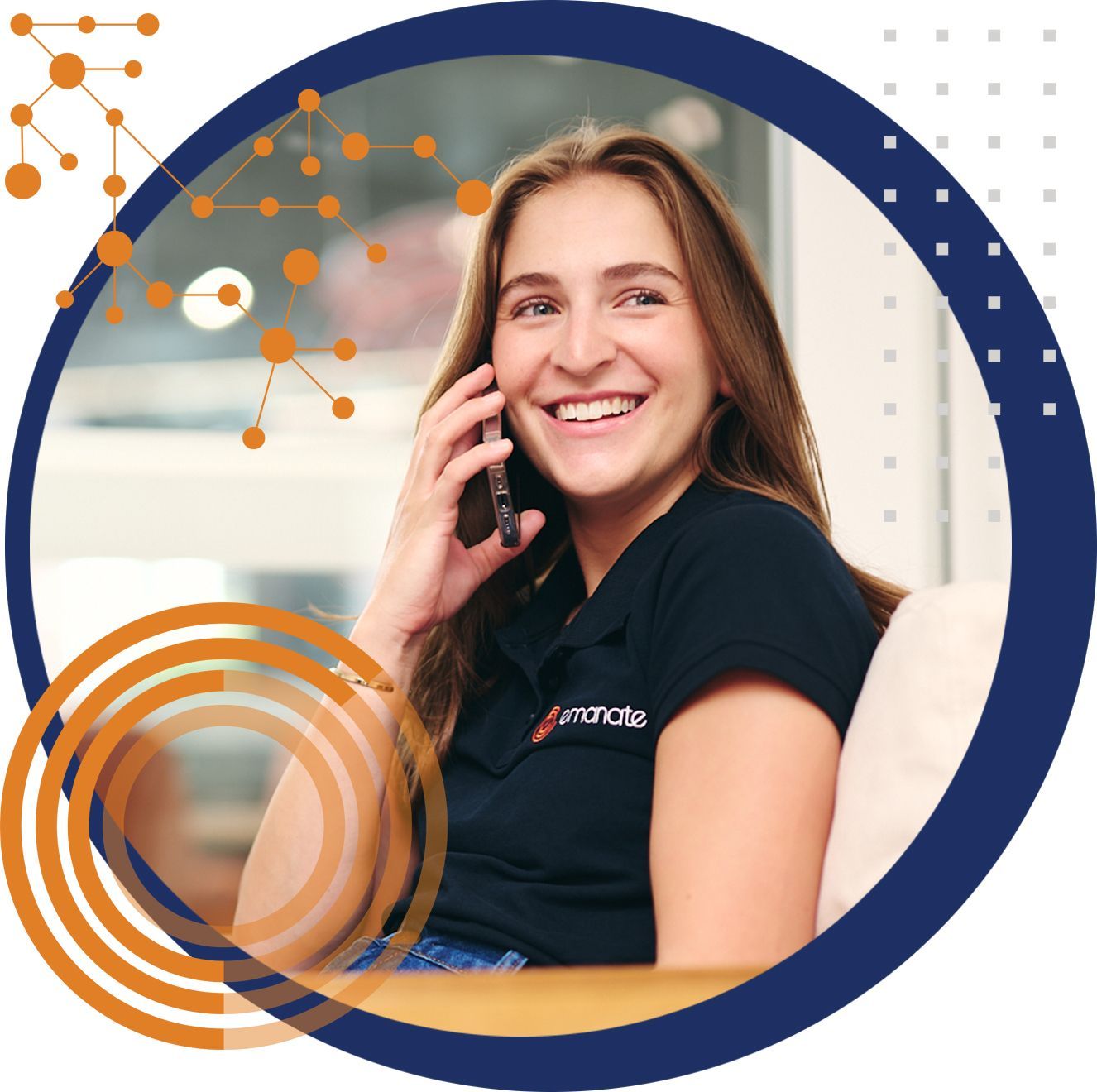 A woman is smiling while talking on a cell phone