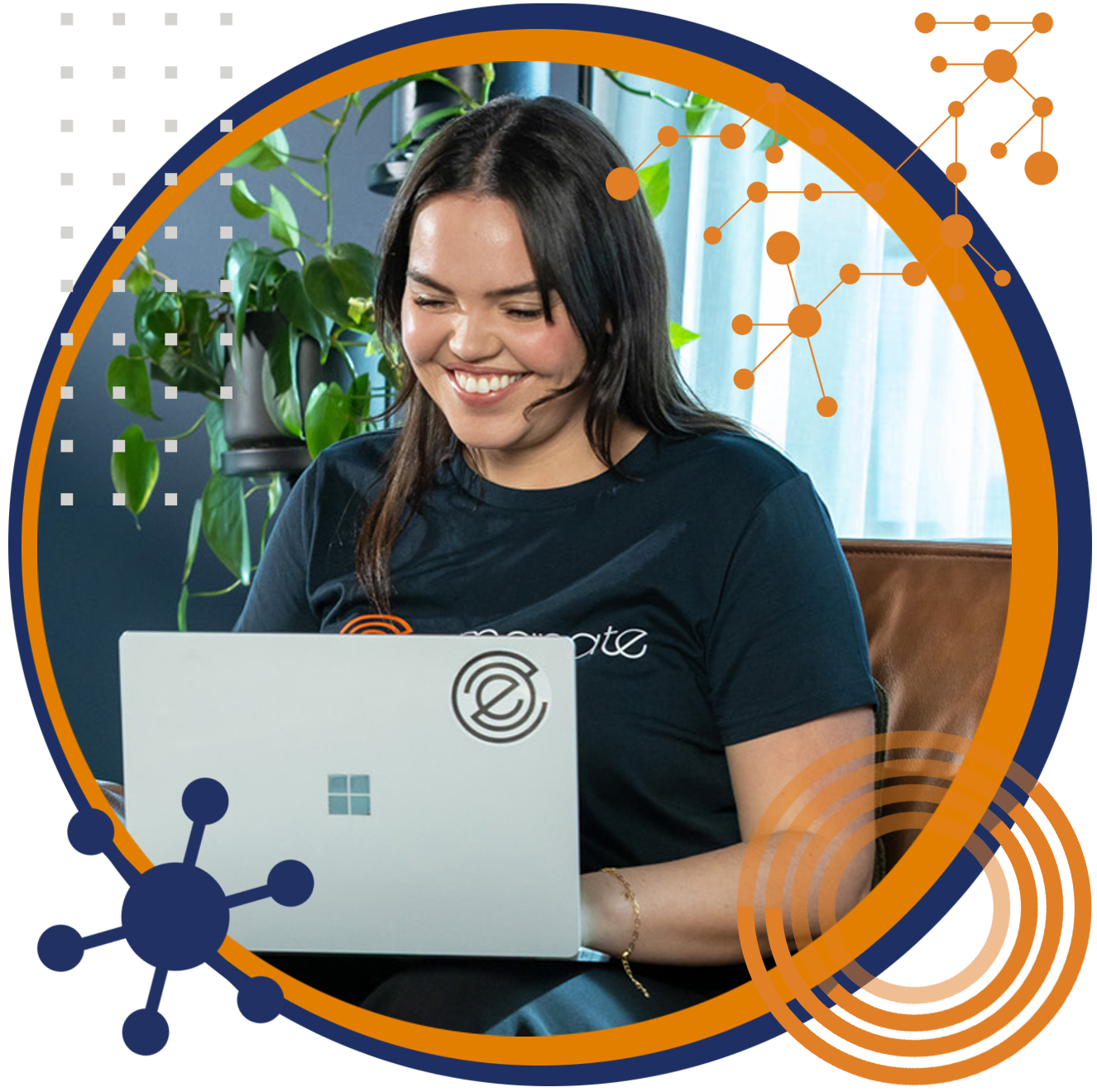 Man on phone and woman using a laptop smiling, sitting by a chessboard. Inside an orange circle graphic.