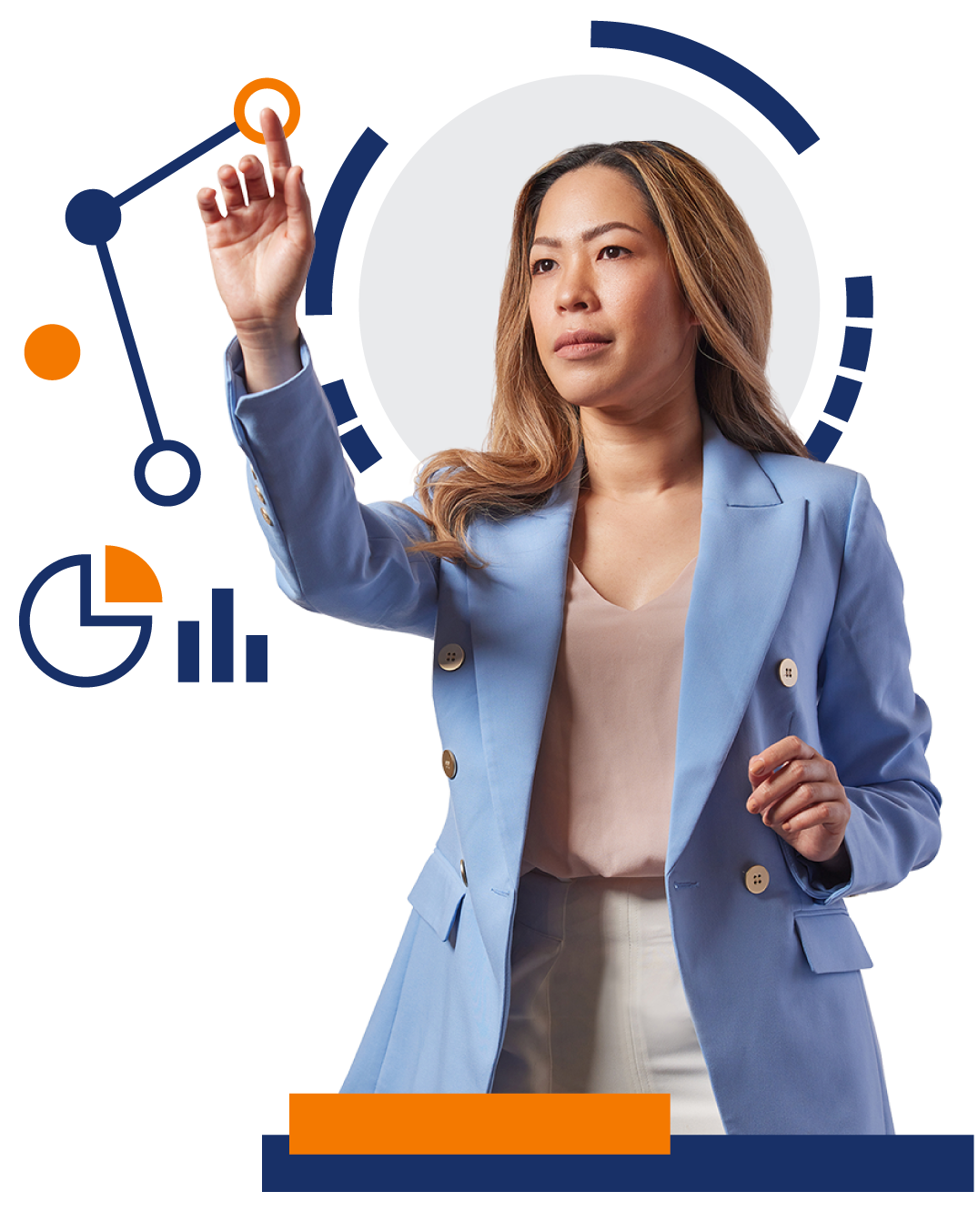 A woman in a blue jacket is writing on a whiteboard.