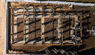 An aerial view of a building under construction.