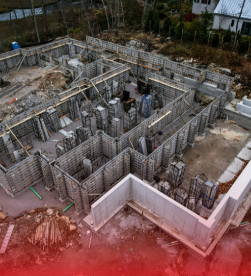 An aerial view of a building under construction.