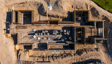 An aerial view of a building under construction.