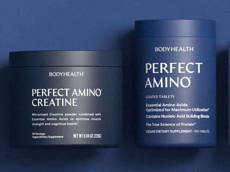 Two BodyHealth Perfect Amino containers on a blue background