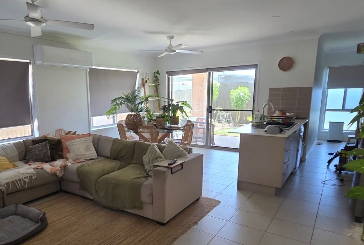 Loungeroom with Celing Fans and Open Plan Kitchen — MVP Painting Professionals in Buderim, QLD 