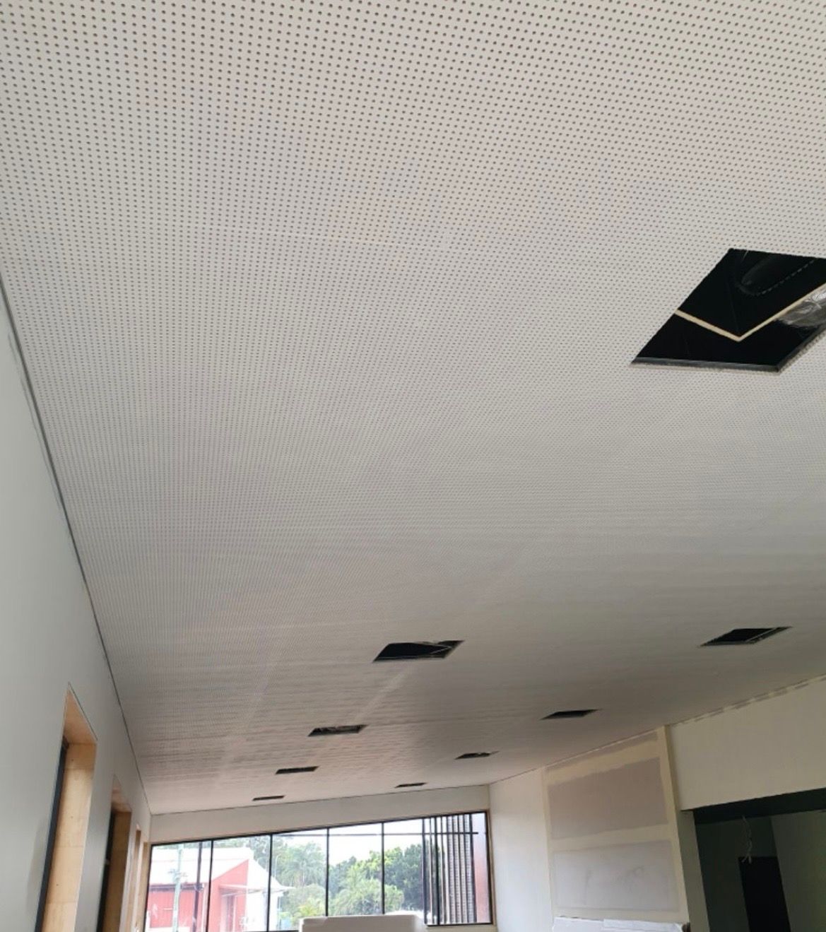 White Perforated Ceiling With Several Open Square Access Panels — MVP Painting Professionals in Sippy Downs, QLD