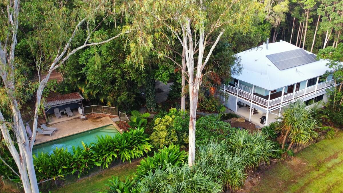 House With White Veranda and Solar Panels — MVP Painting Professionals in Glass House Mountains, QLD