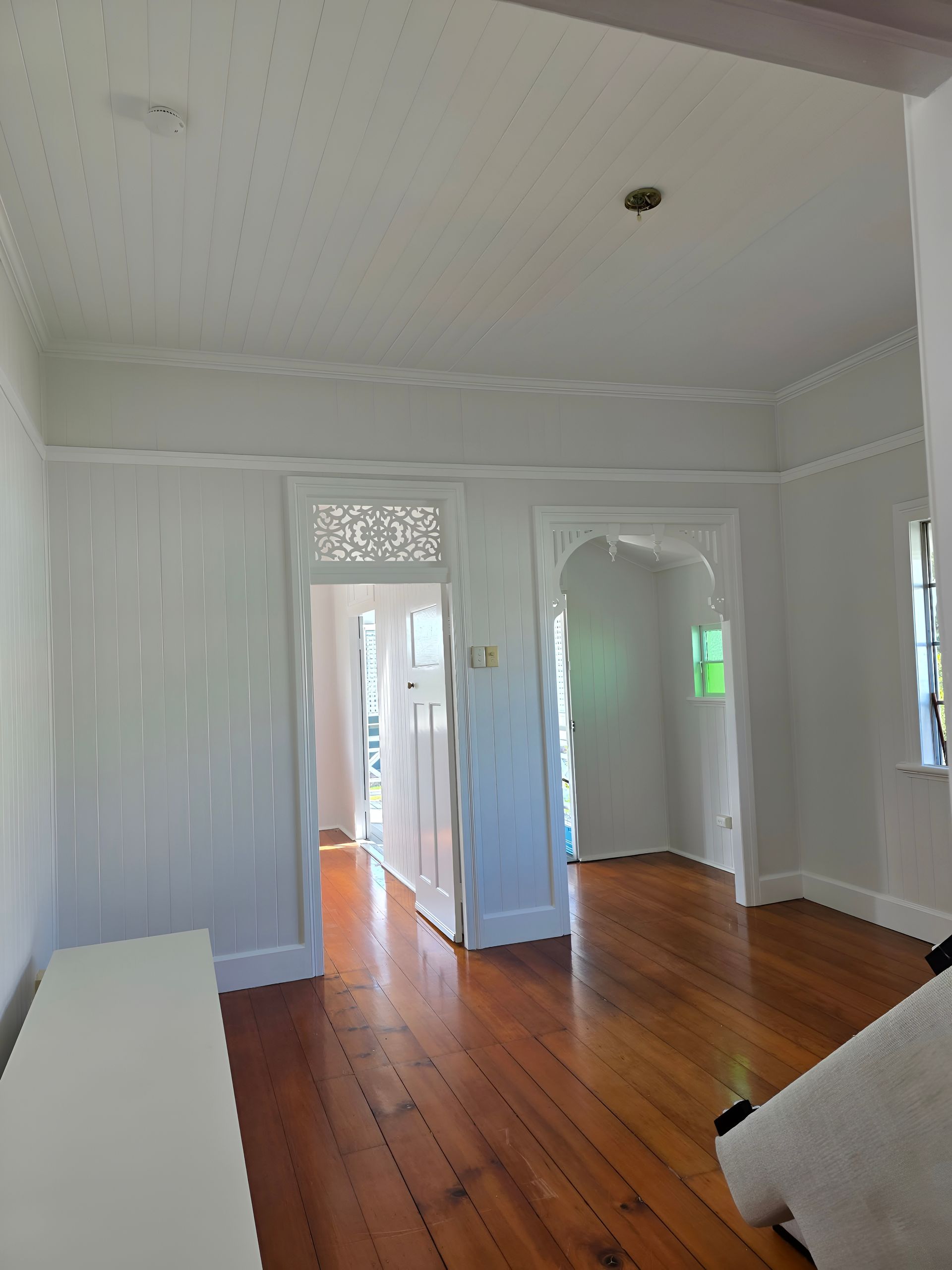 Empty White-walled Room With Wooden Floors — MVP Painting Professionals in Sunshine Coast, QLD