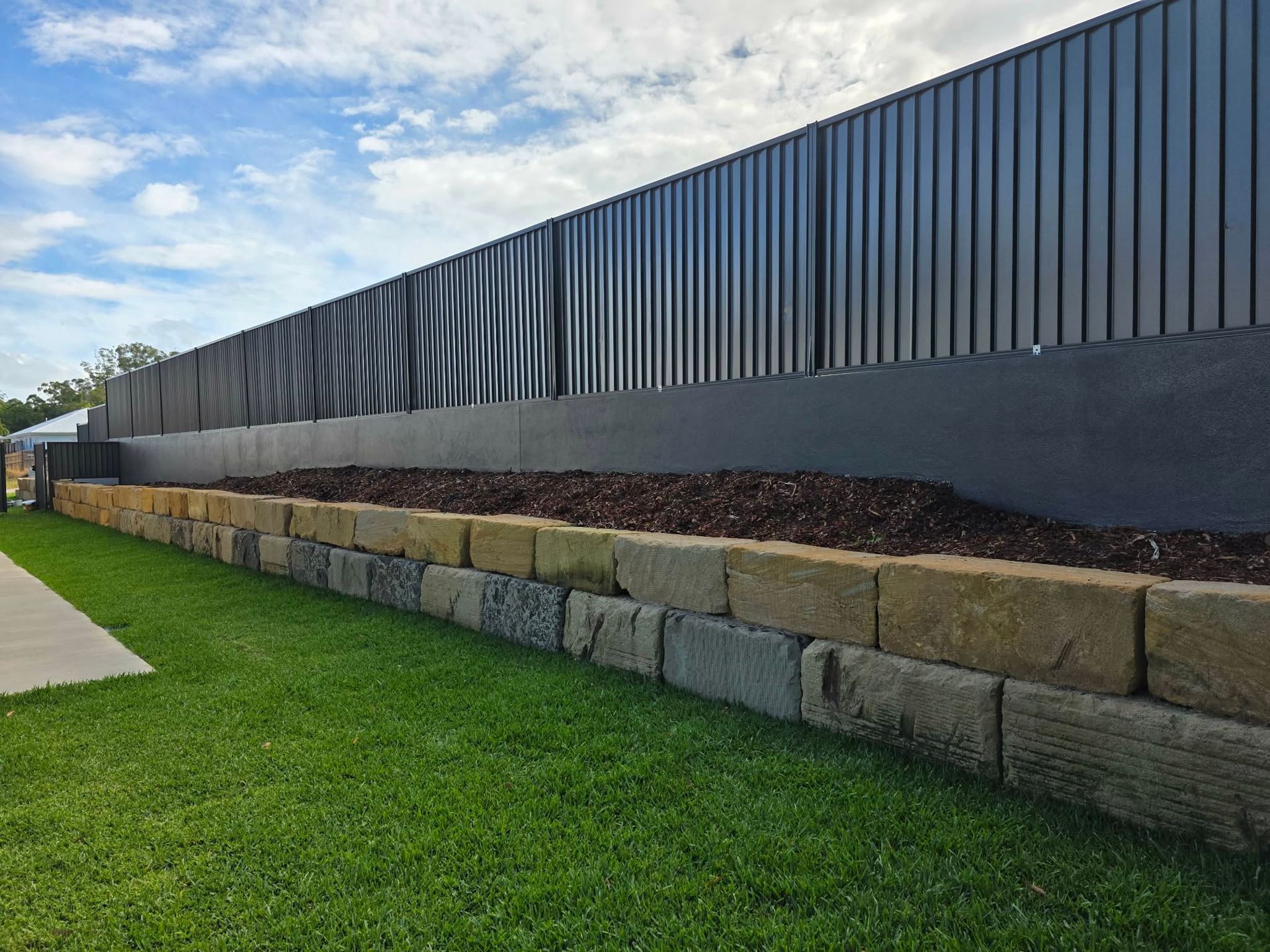 A Fence With Dark Gray Colour — MVP Painting Professionals in Sunshine Coast, QLD