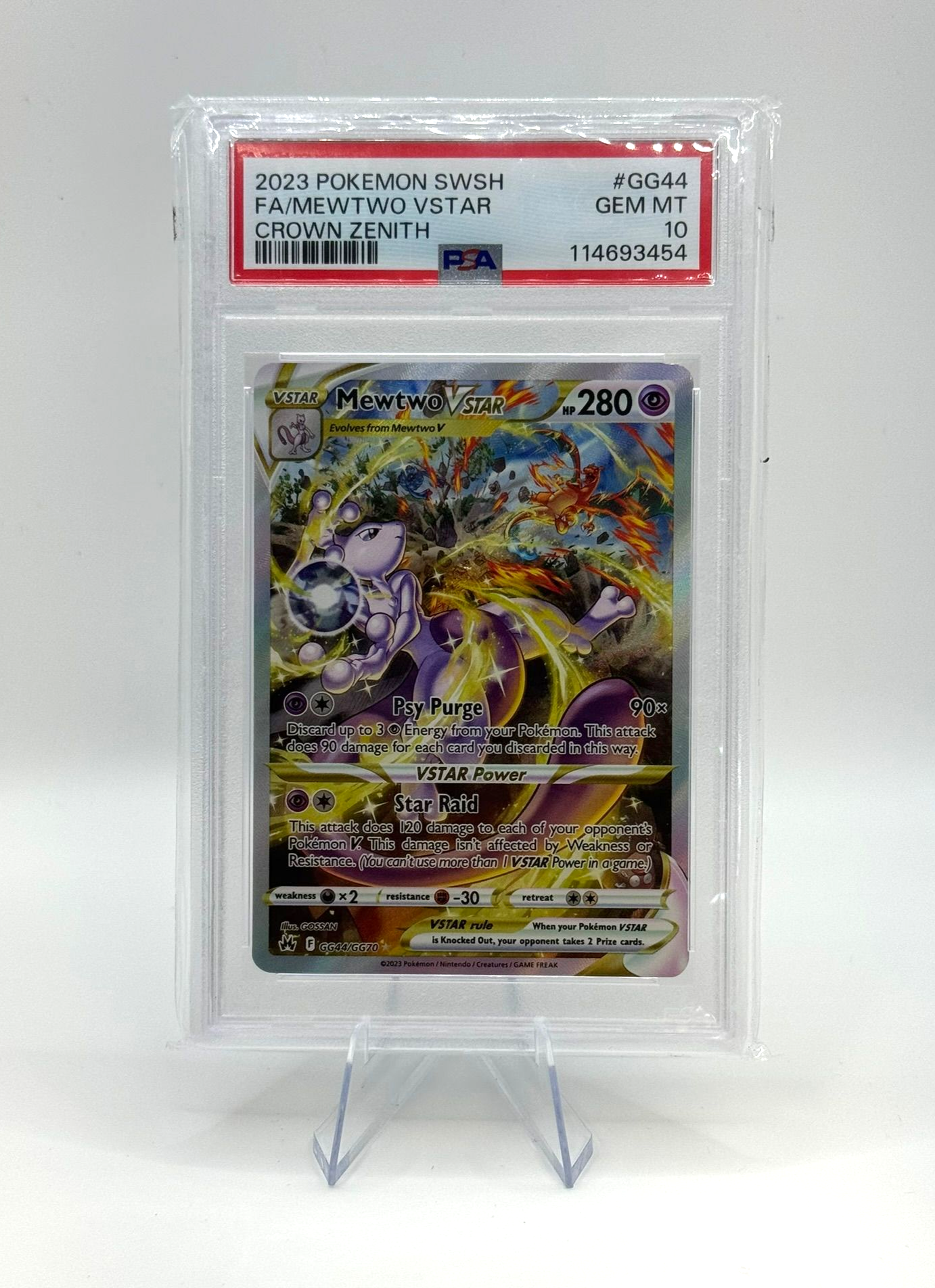 Pokémon trading card game booster pack in yellow retail packaging on a textured wooden surface