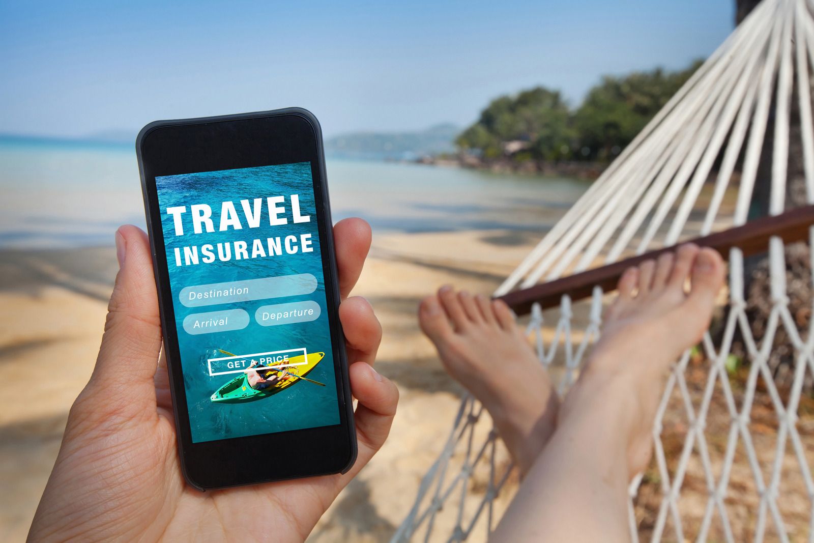 Person relaxing in hammock, holding phone with