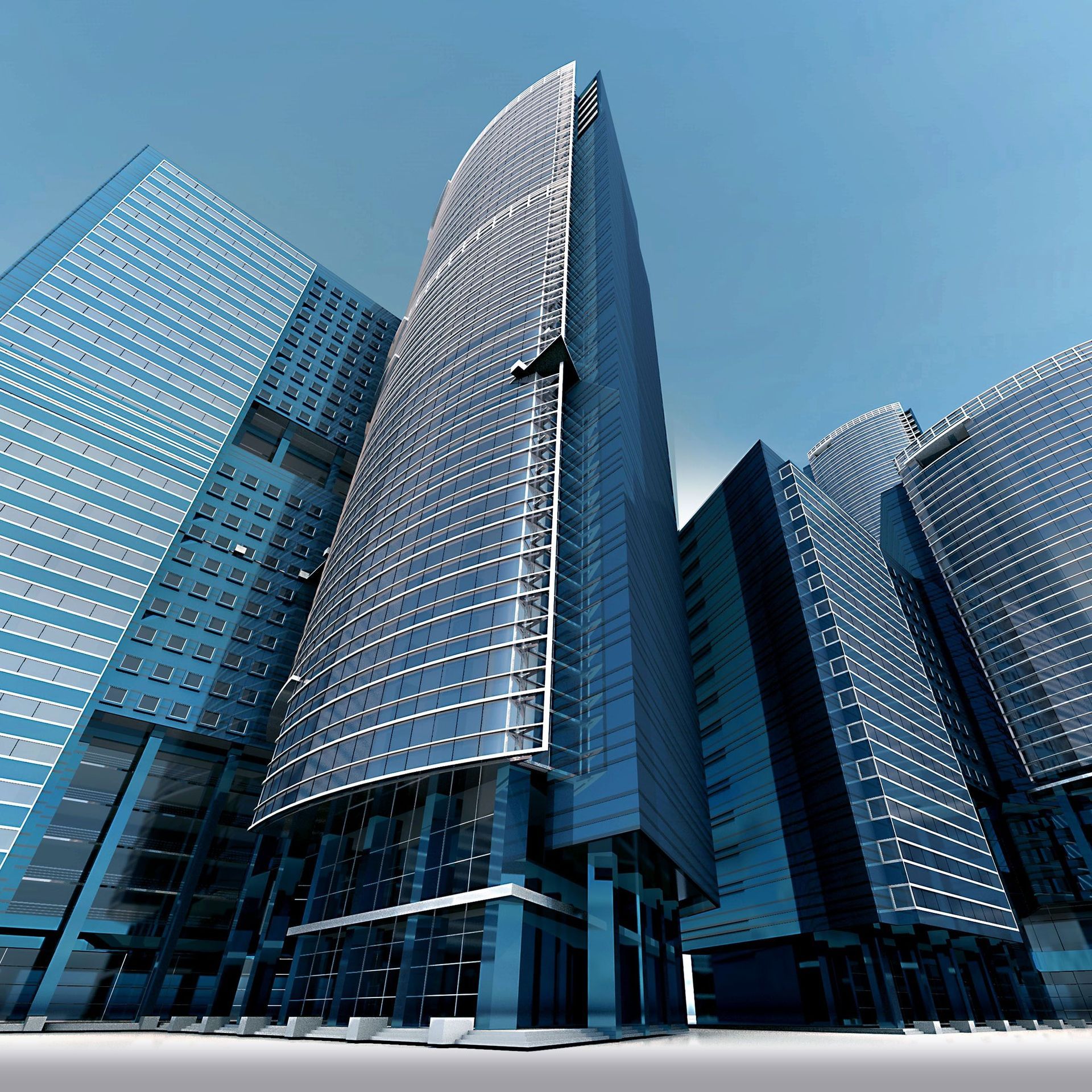 Modern glass skyscrapers against a clear blue sky