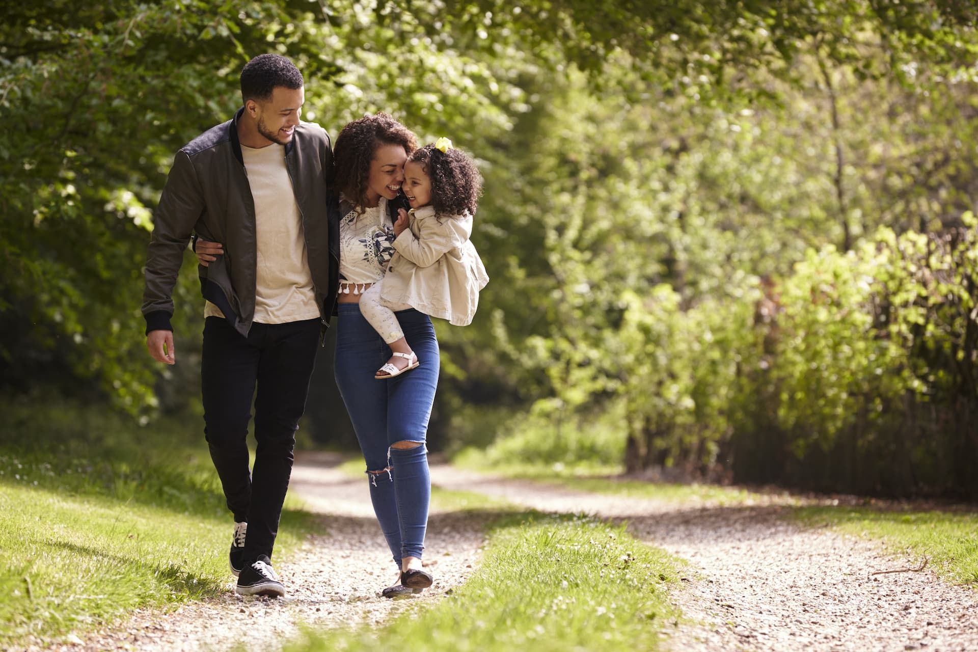 Family Walking Down a Path