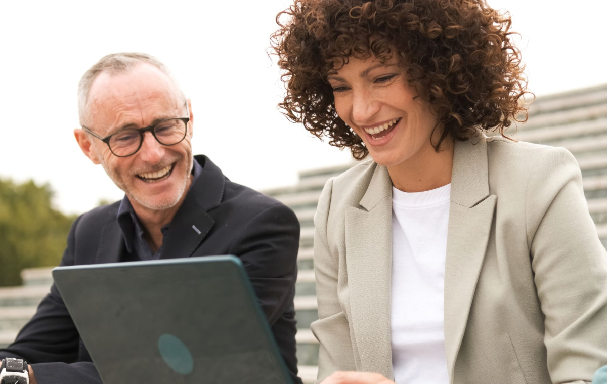 We're happy to help you build yours Two people working together at a laptop
