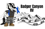 Cartoon badger holding wrench, Badger Canyon RV logo with mountains and trees in background.