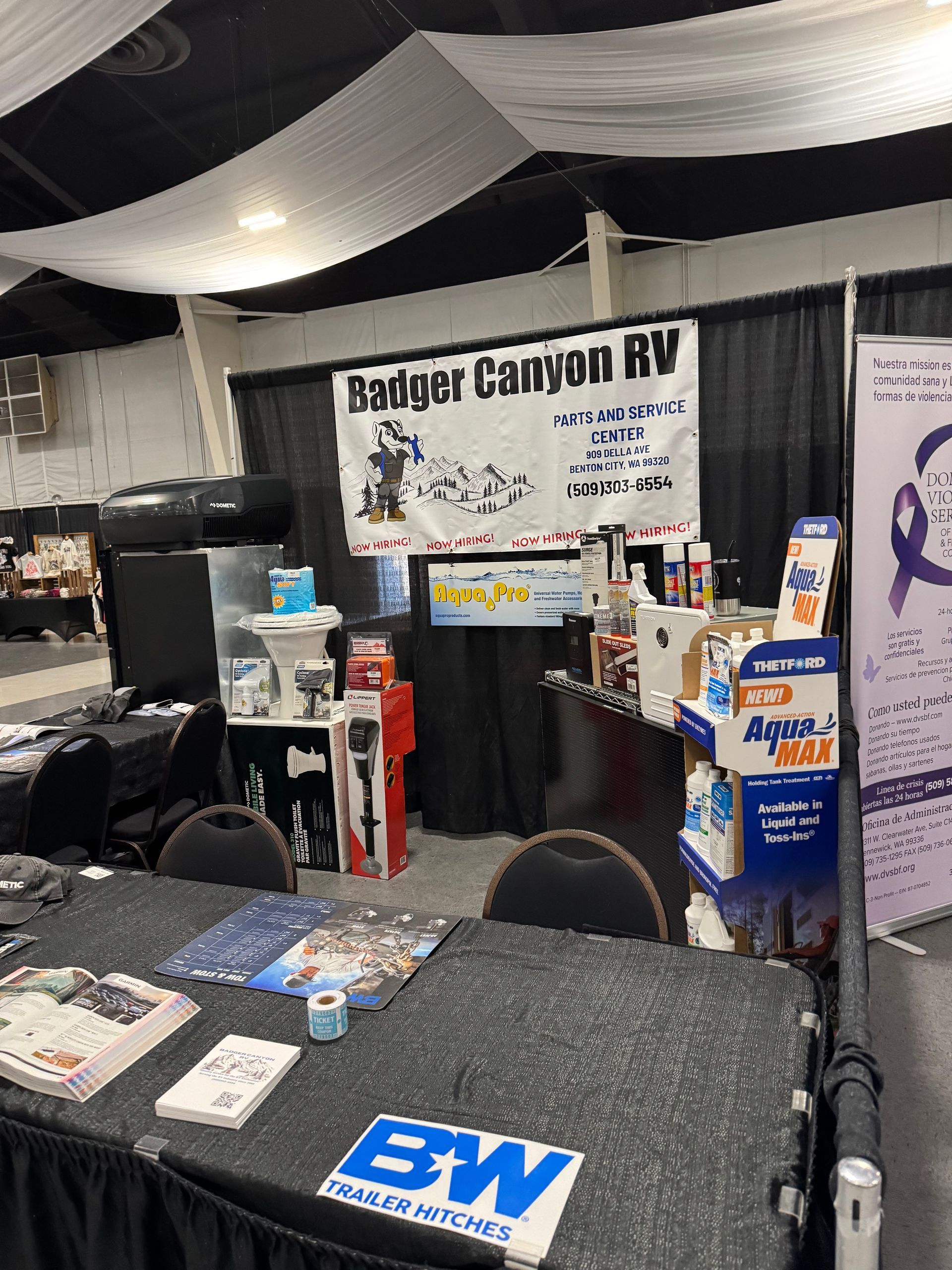 RV dealership booth with banner 