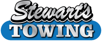 Stewart's Towing logo with silver text and a blue oval.