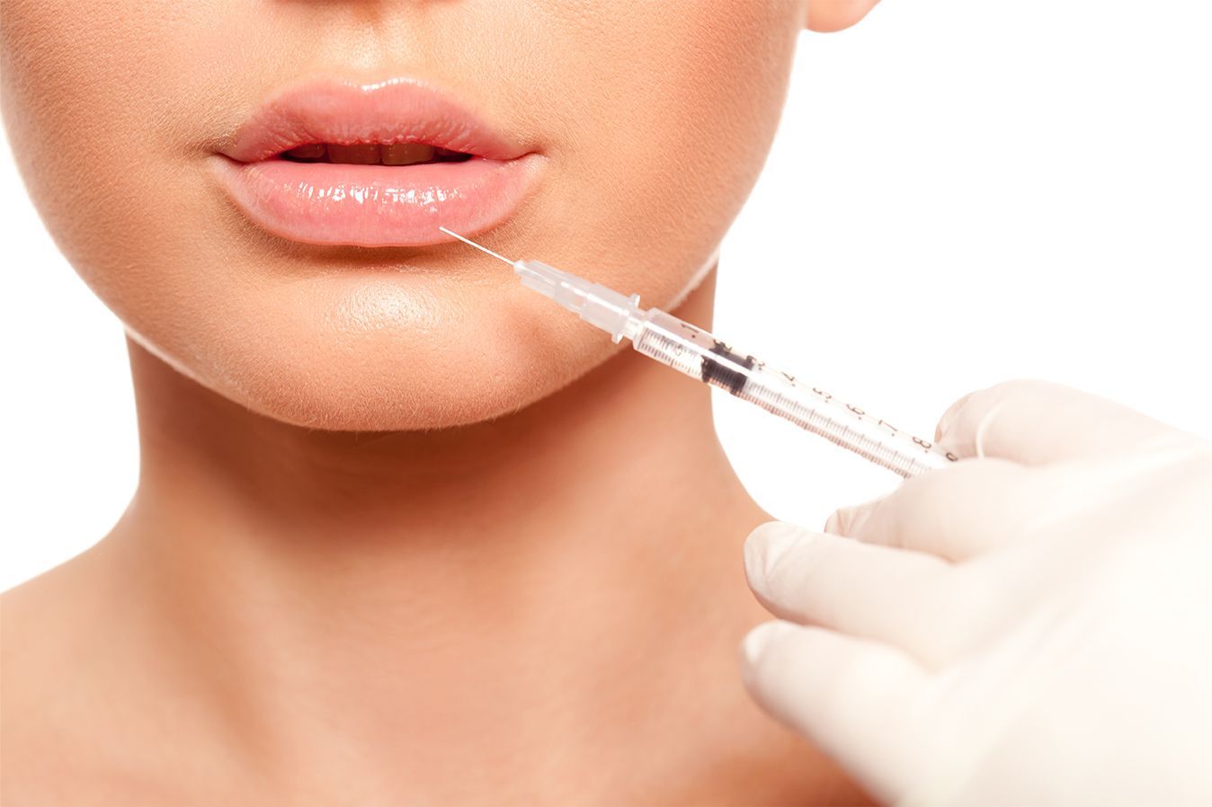Patient getting lip filler injection at Z Aesthetic Dermatology in Baton Rouge