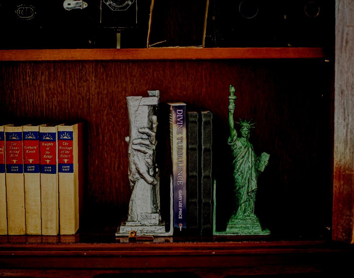 The Statue of Liberty and Statue of Responsibility bronze statue bookends