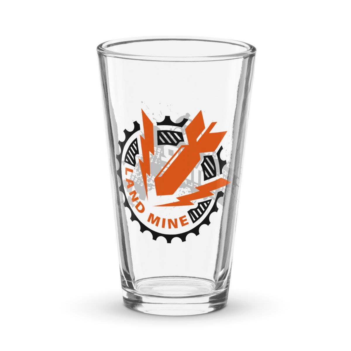 Clear pint glass with a black and orange “Born to Mine” graphic and gear emblem