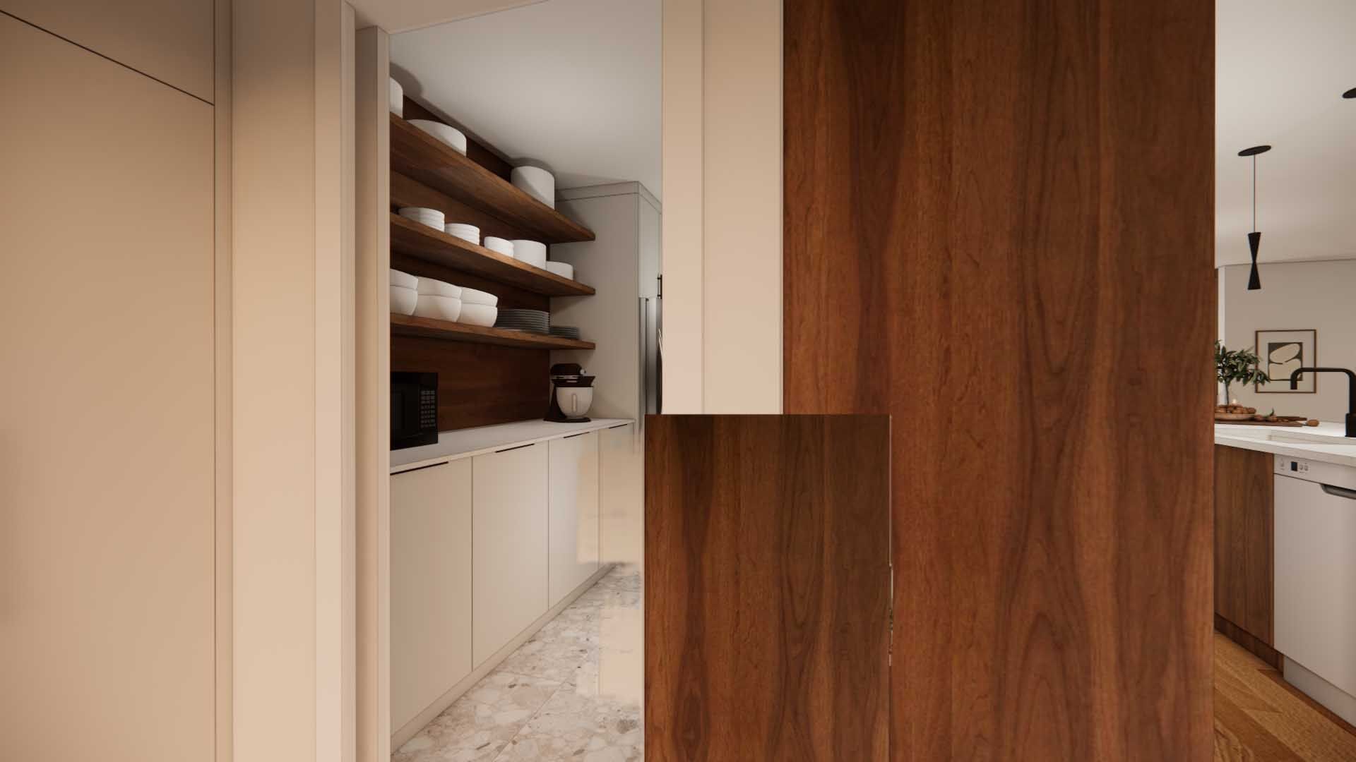 A kitchen with a wooden door leading to a pantry.