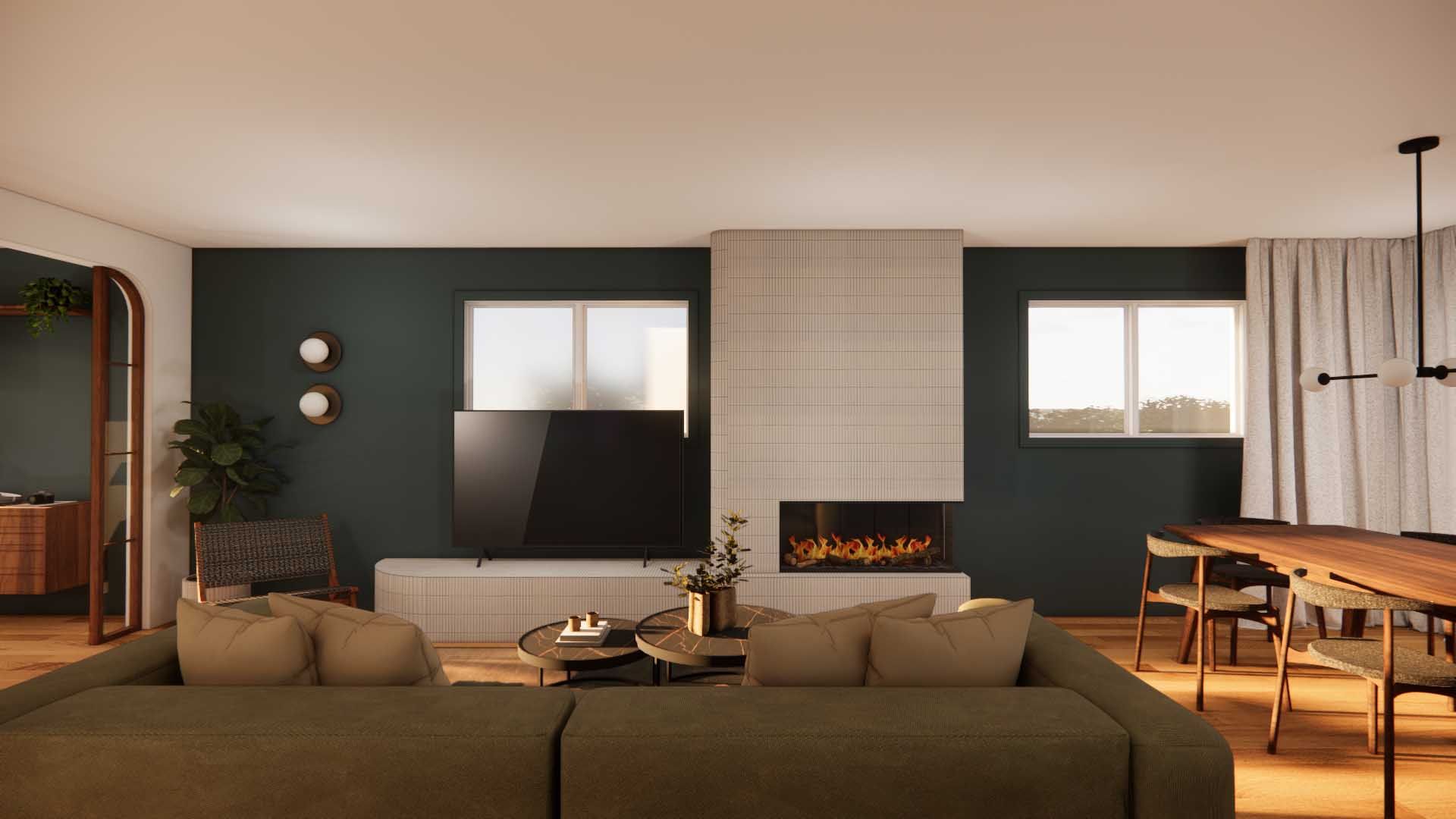 A living room with a couch , television , fireplace and dining table.