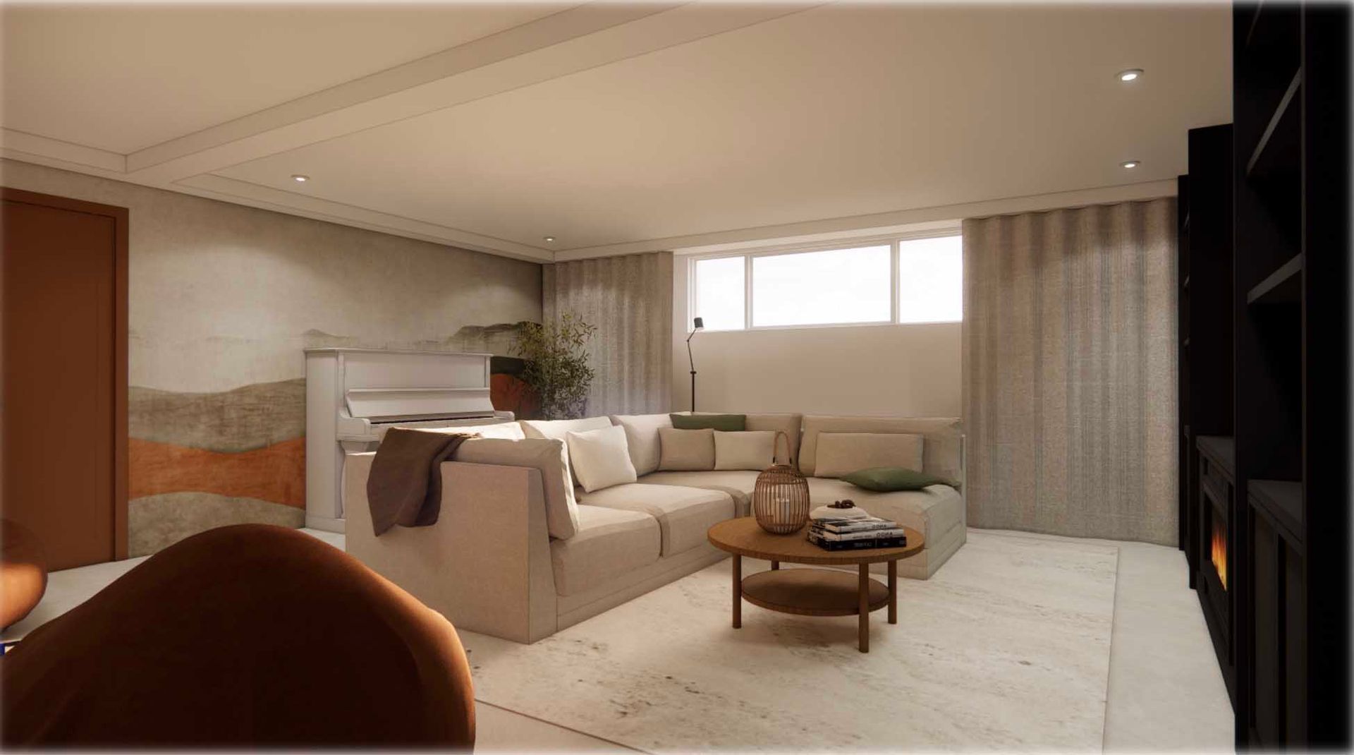 A living room with a couch , coffee table and fireplace.