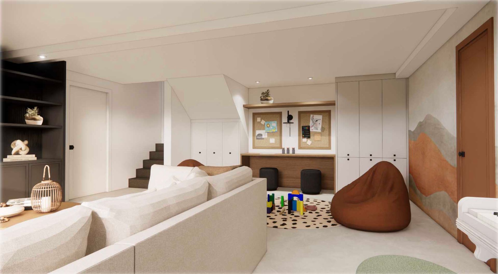 A living room with a couch , bean bag chairs and a desk.