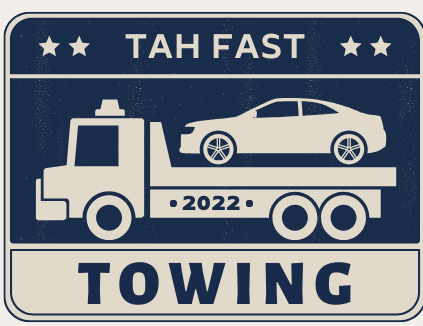 A towing truck with a car on the back of it.