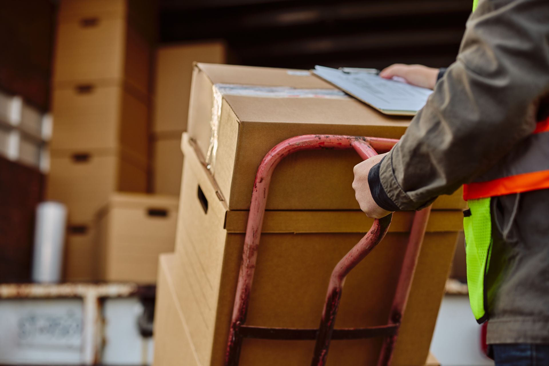Delivery Person Loading Boxes onto a Truck — The Move It Man In Bentley Park, QLD