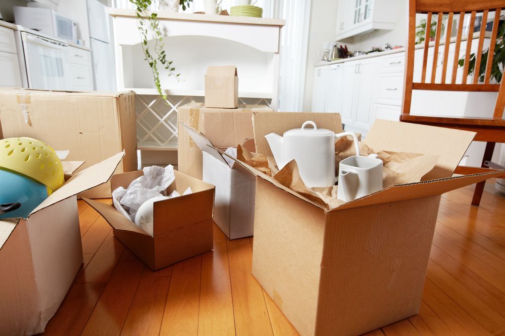 Boxes Packed With Belongings in a Room — The Move It Man In Bentley Park, QLD