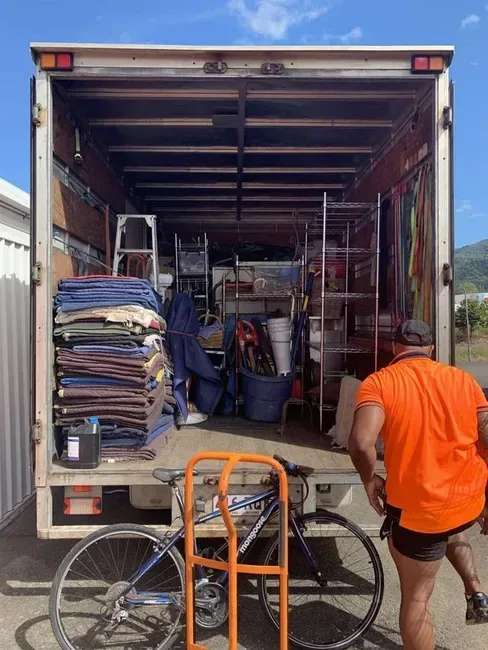 A Man Loads a Truck Full of Household Items — The Move It Man In Bentley Park, QLD