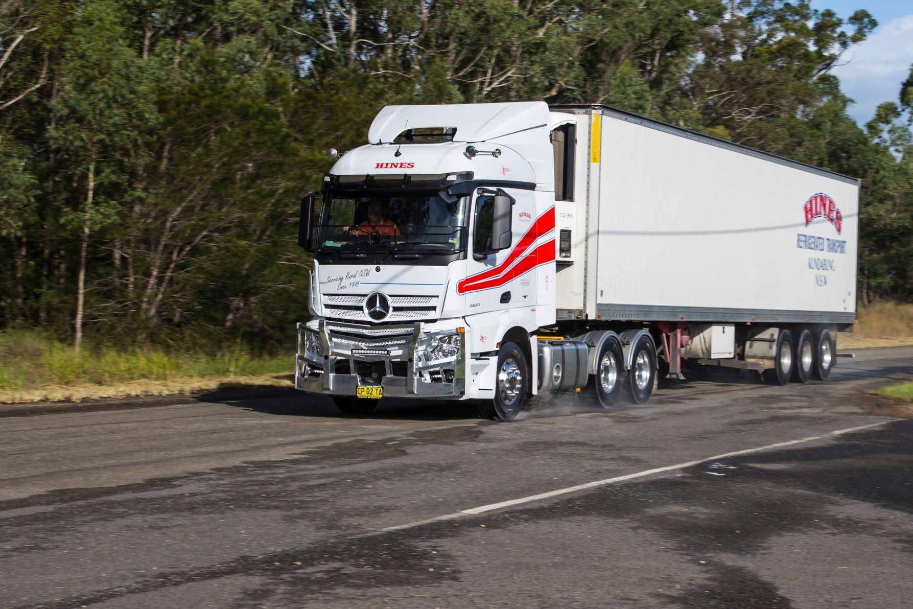 White Semi-truck on a Road, Transporting Goods — Hines Logistic Pty Ltd In Kundabung, NSW