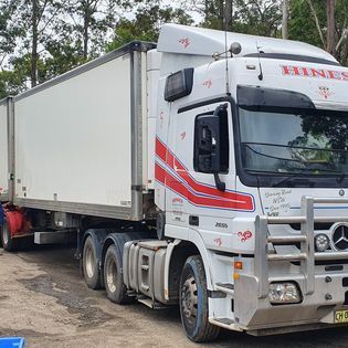 White Hines Semi-truck With White Trailer; Parked on Dirt — Hines Logistic Pty Ltd In Newcastle, NSW