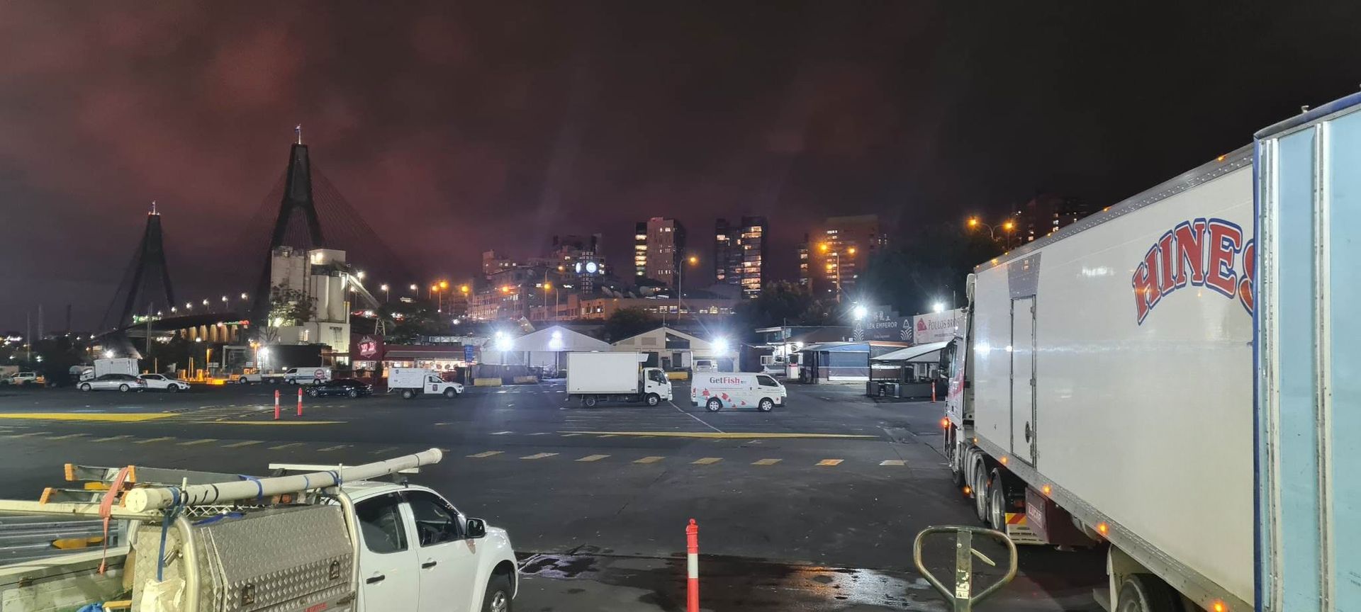 Nighttime View of a Bridge and City Skyline — Hines Logistic Pty Ltd In Kundabung, NSW