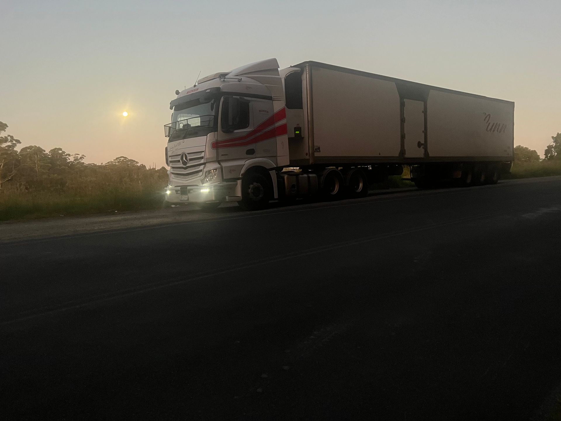 Truck Parked on the Side of a Road at Dusk — Hines Logistic Pty Ltd In Sydney, NSW