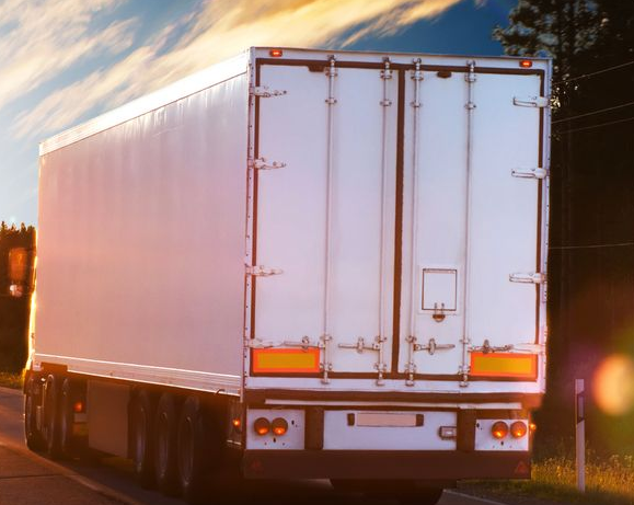 White Semi-truck on a Road, Driving Toward a Sunset — Hines Logistic Pty Ltd In Kempsey, NSW